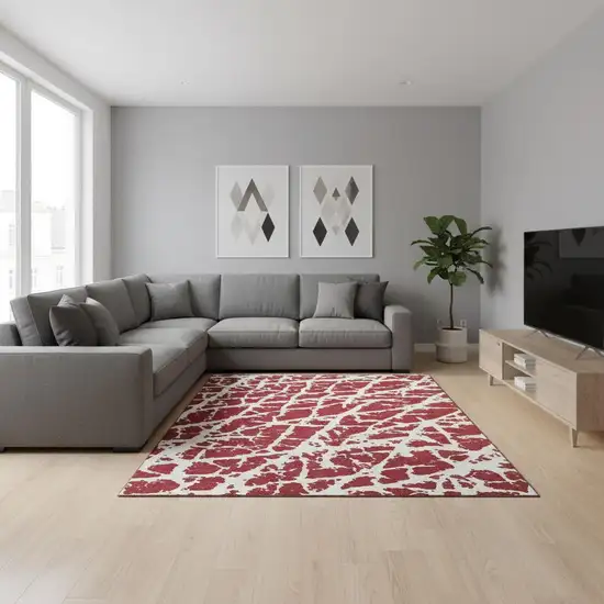 Red And Ivory Abstract Washable Area Rug With UV Protection Photo 1