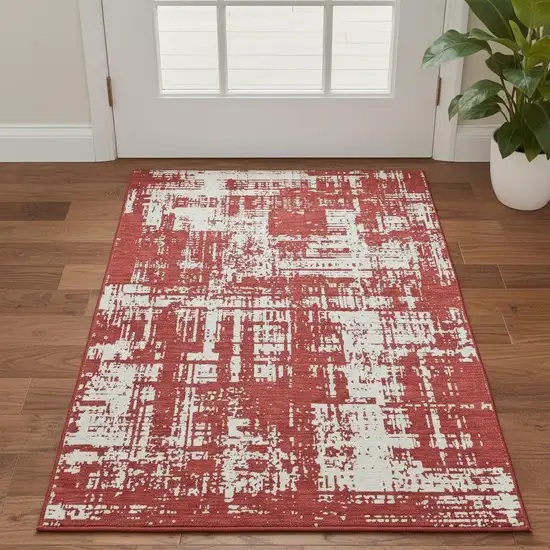 Red And Ivory Abstract Washable Area Rug With UV Protection Photo 2