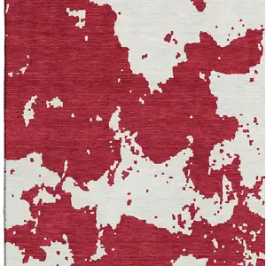 Photo of Red And Ivory Abstract Washable Area Rug With UV Protection