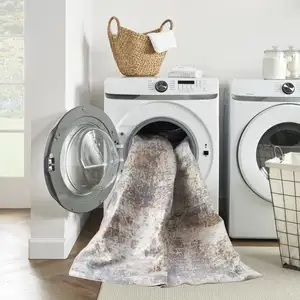 Photo of Red And Ivory Abstract Washable Area Rug