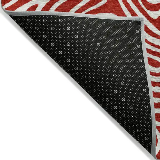 Red And Ivory Abstract Washable Indoor Outdoor Area Rug Photo 4
