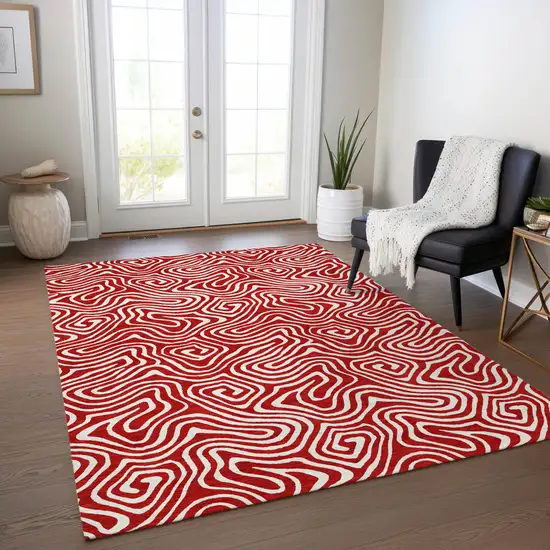 Red And Ivory Abstract Washable Indoor Outdoor Area Rug Photo 9