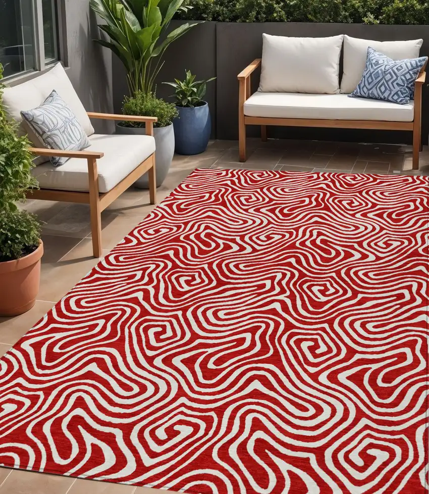 Red And Ivory Abstract Washable Indoor Outdoor Area Rug Photo 1