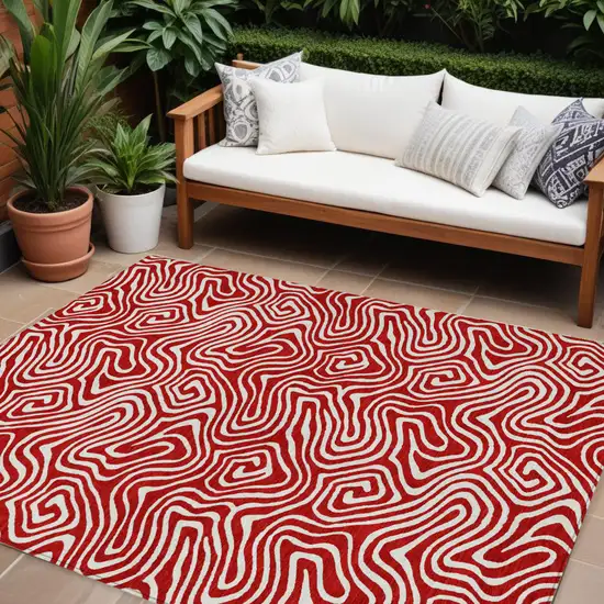 Red And Ivory Abstract Washable Indoor Outdoor Area Rug Photo 1