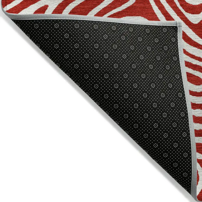 Red And Ivory Abstract Washable Indoor Outdoor Area Rug Photo 4