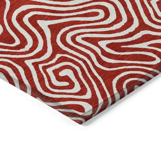 Red And Ivory Abstract Washable Indoor Outdoor Area Rug Photo 3