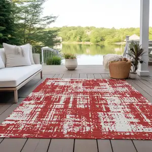 Photo of Red And Ivory Abstract Washable Indoor Outdoor Area Rug