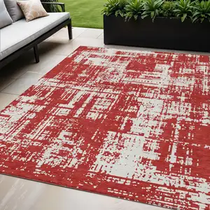 Photo of Red And Ivory Abstract Washable Indoor Outdoor Area Rug