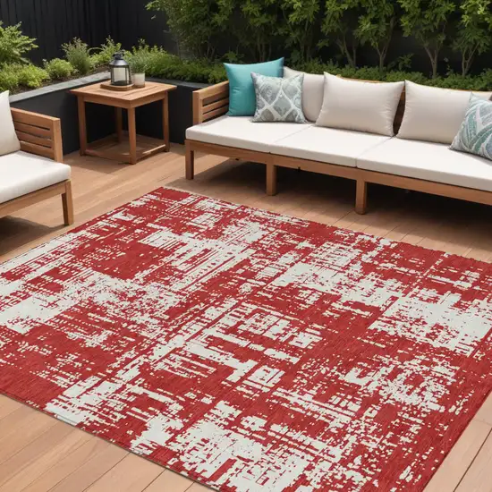 Red And Ivory Abstract Washable Indoor Outdoor Area Rug Photo 1