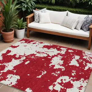 Photo of Red And Ivory Abstract Washable Indoor Outdoor Area Rug