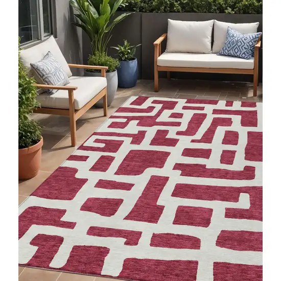 Red And Ivory Abstract Washable Indoor Outdoor Area Rug Photo 1