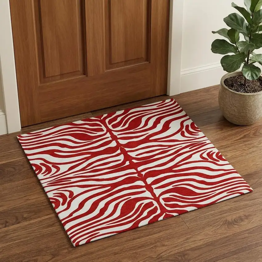 Red And Ivory Animal Print Washable Area Rug With UV Protection Photo 1