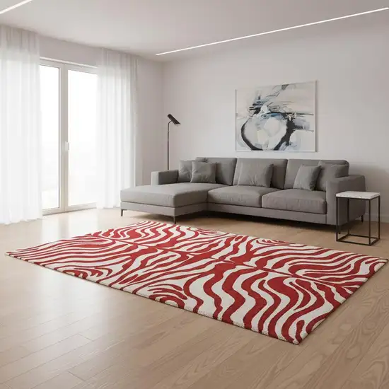 Red And Ivory Animal Print Washable Area Rug With UV Protection Photo 2
