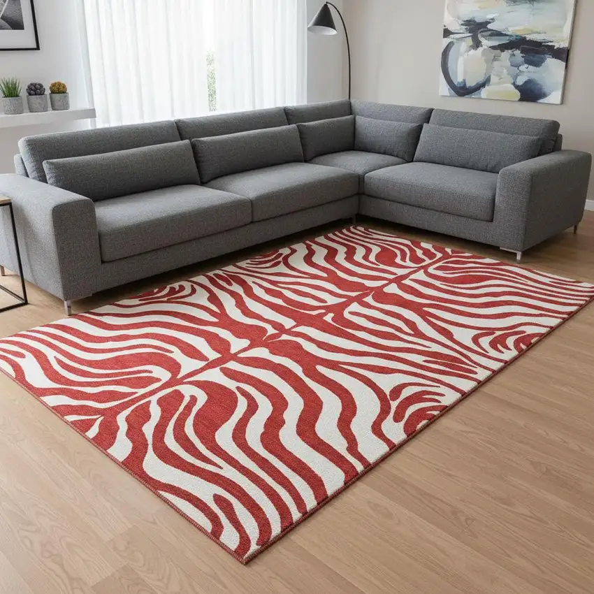 Red And Ivory Animal Print Washable Area Rug With UV Protection Photo 2