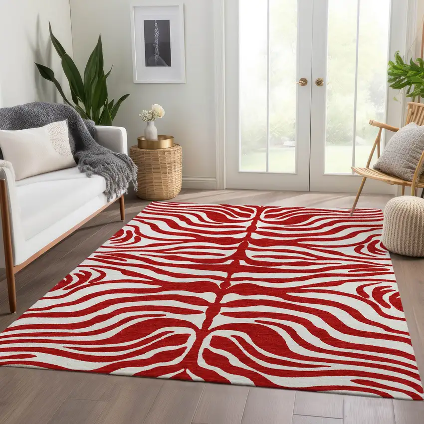 Red And Ivory Animal Print Washable Area Rug With UV Protection Photo 5