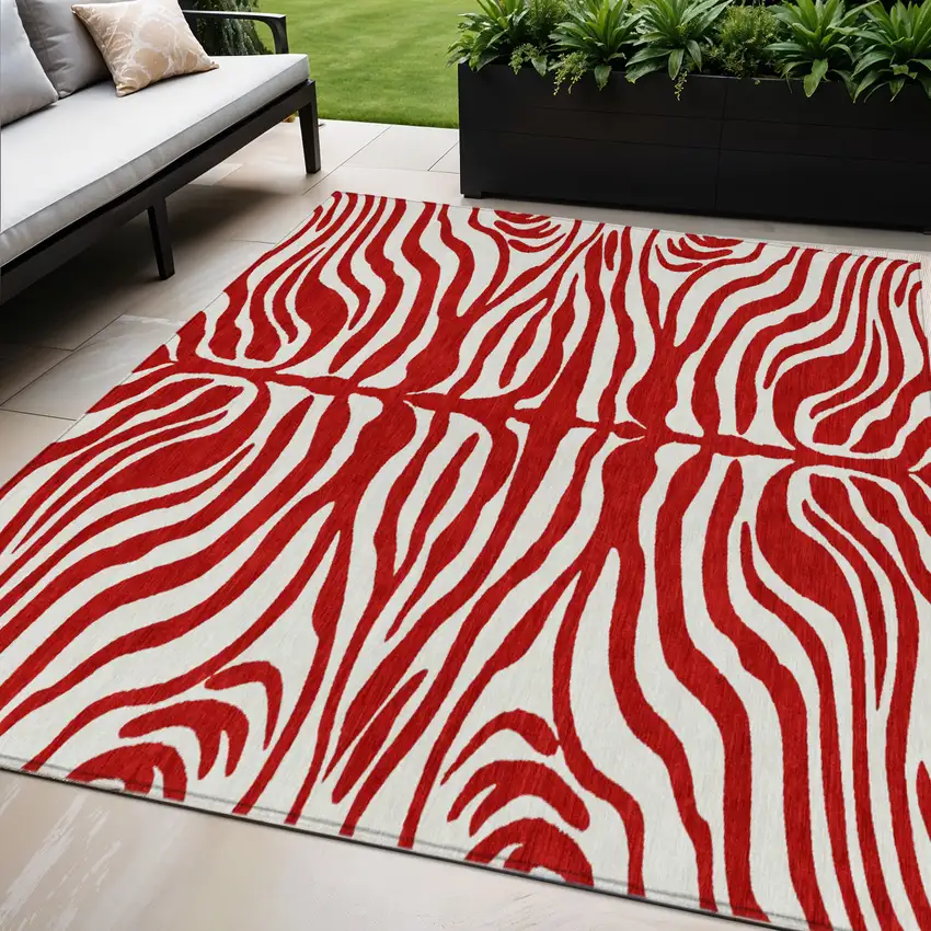 Red And Ivory Animal Print Washable Indoor Outdoor Area Rug Photo 1