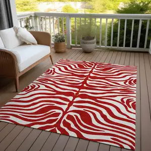 Photo of Red And Ivory Animal Print Washable Indoor Outdoor Area Rug