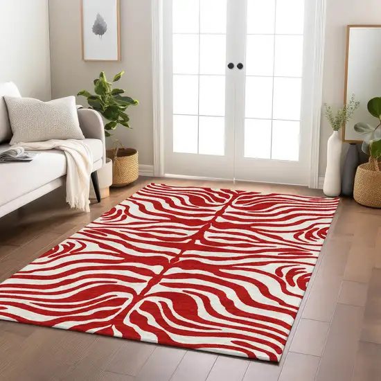 Red And Ivory Animal Print Washable Indoor Outdoor Area Rug Photo 9