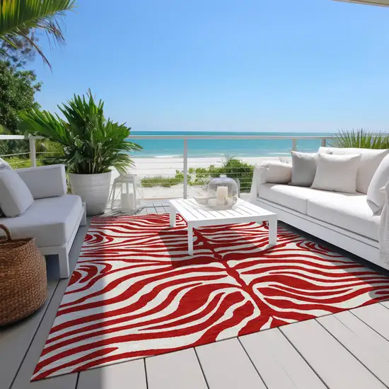 Red And Ivory Animal Print Washable Indoor Outdoor Area Rug Photo 9
