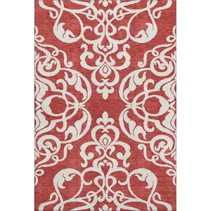 Photo of Red And Ivory Damask Washable Area Rug With UV Protection