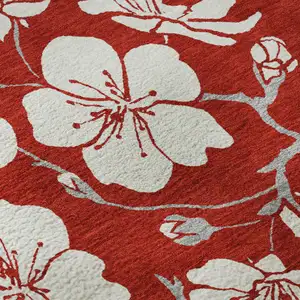 Photo of Red And Ivory Floral Washable Area Rug With UV Protection