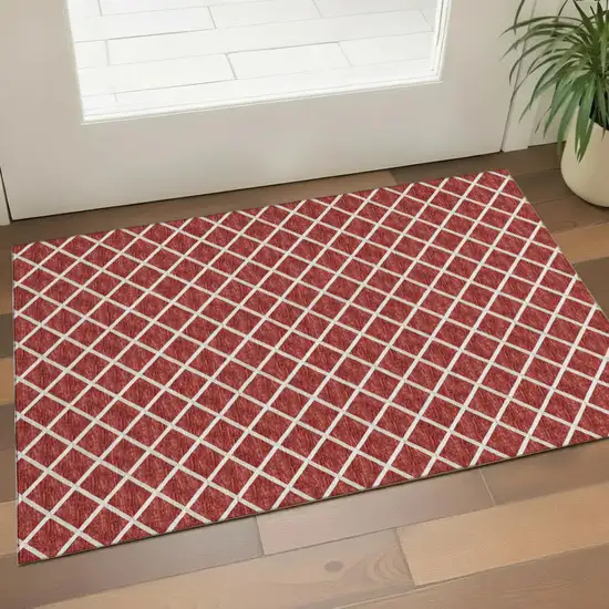 Red And Ivory Geometric Washable Area Rug With UV Protection Photo 1
