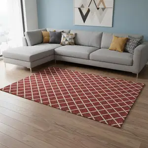 Photo of Red And Ivory Geometric Washable Area Rug With UV Protection