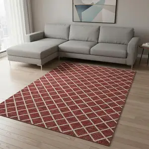 Photo of Red And Ivory Geometric Washable Area Rug With UV Protection