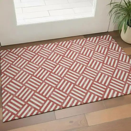Red And Ivory Geometric Washable Area Rug With UV Protection Photo 1