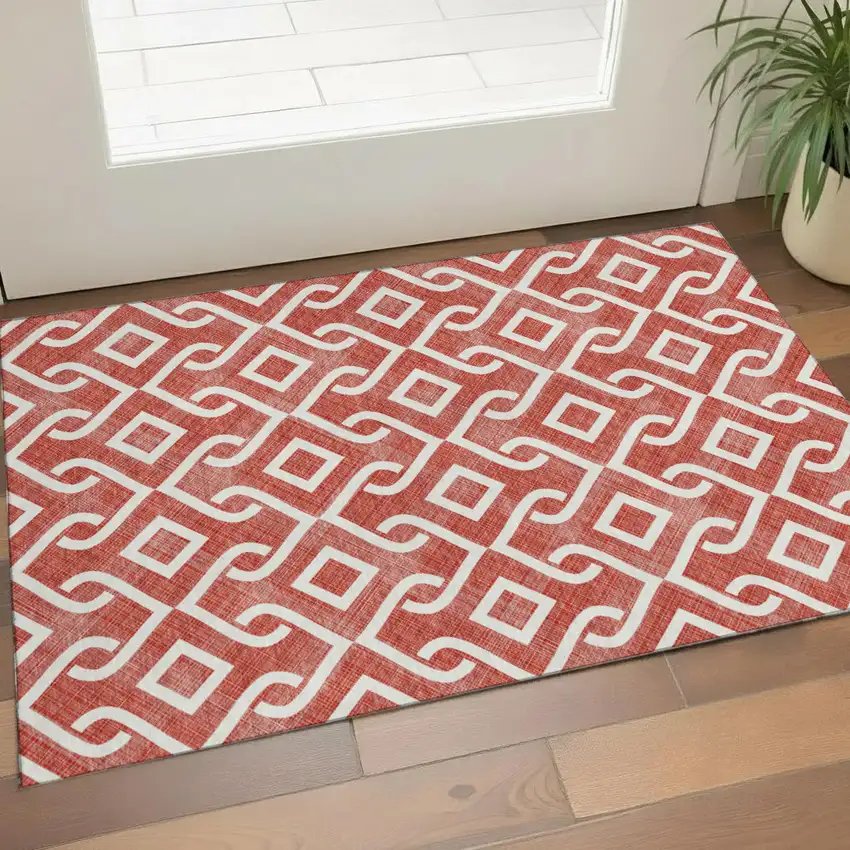 Red And Ivory Geometric Washable Area Rug With UV Protection Photo 1