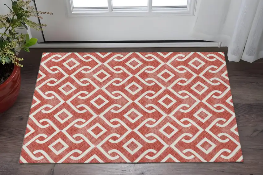 Red And Ivory Geometric Washable Area Rug With UV Protection Photo 3