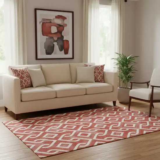 Red And Ivory Geometric Washable Area Rug With UV Protection Photo 1