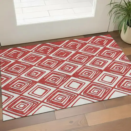 Red And Ivory Geometric Washable Area Rug With UV Protection Photo 1