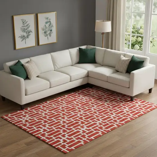 Red And Ivory Geometric Washable Area Rug With UV Protection Photo 1