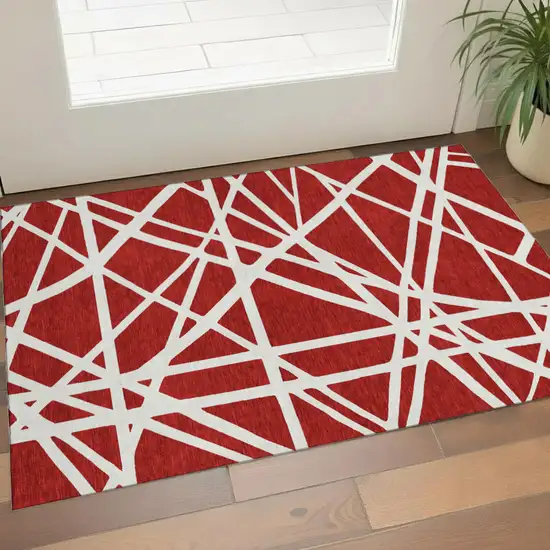 Red And Ivory Geometric Washable Area Rug With UV Protection Photo 1