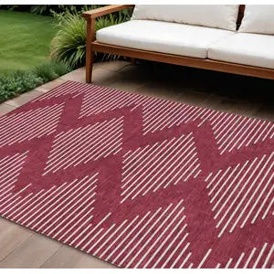 Photo of Red And Ivory Geometric Washable Indoor Outdoor Area Rug
