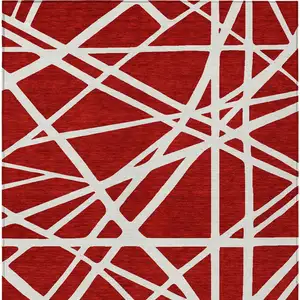 Photo of Red And Ivory Geometric Washable Indoor Outdoor Area Rug