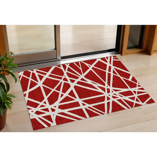 Red And Ivory Geometric Washable Indoor Outdoor Area Rug Photo 1