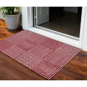 Photo of Red And Ivory Geometric Washable Indoor Outdoor Area Rug