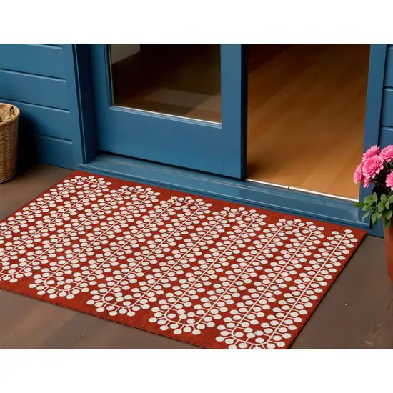 Red And Ivory Geometric Washable Indoor Outdoor Area Rug Photo 1