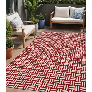 Photo of Red And Ivory Geometric Washable Indoor Outdoor Area Rug