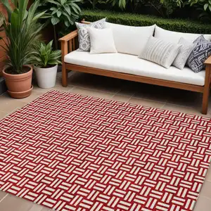 Photo of Red And Ivory Geometric Washable Indoor Outdoor Area Rug