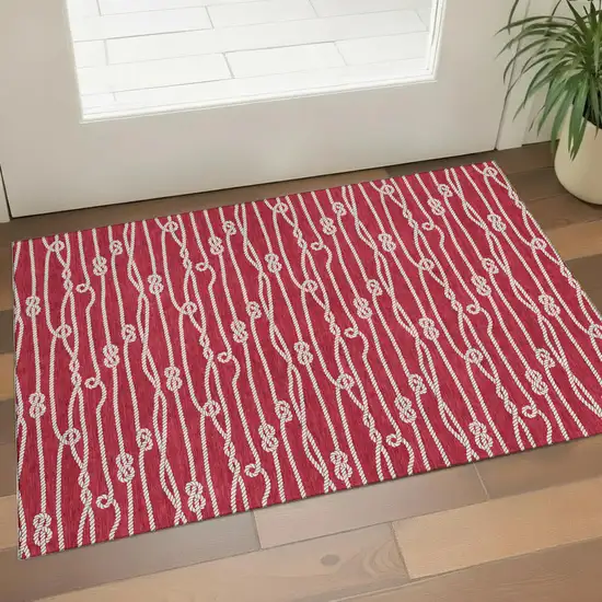 Red And Ivory Nautical Washable Area Rug With UV Protection Photo 1