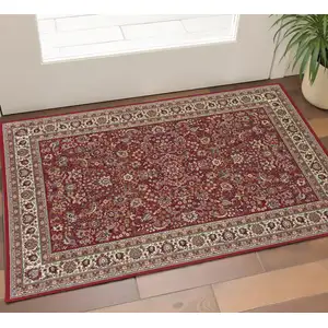 Photo of Red And Ivory Oriental Area Rug