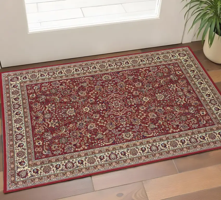 Red And Ivory Oriental Area Rug Photo 1