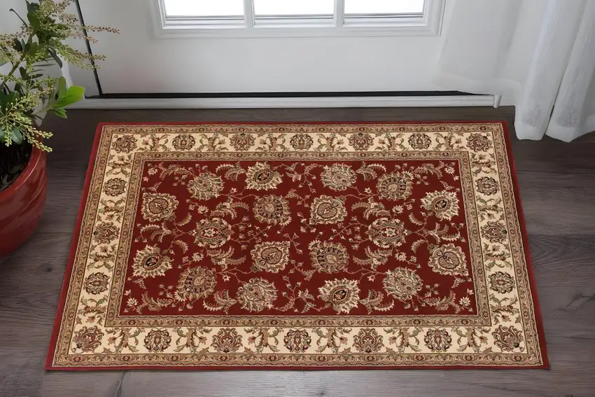 Red And Ivory Oriental Area Rug Photo 1