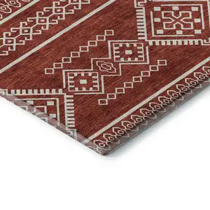 Photo of Red And Ivory Southwestern Washable Area Rug With UV Protection