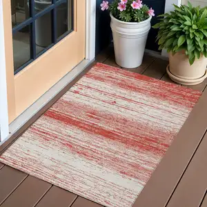 Photo of Red And Ivory Striped Washable Indoor Outdoor Area Rug
