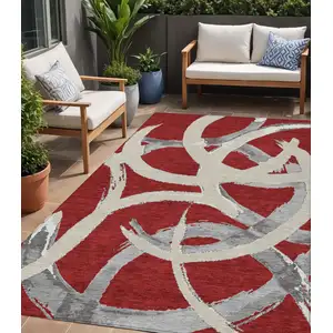 Photo of Red Beige And Gray Abstract Washable Indoor Outdoor Area Rug