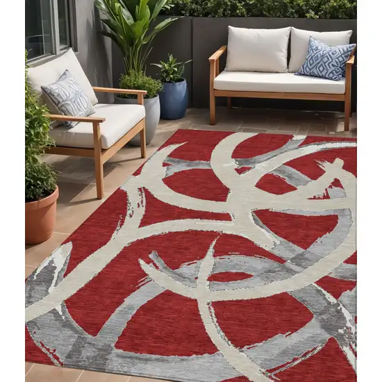 Red Beige And Gray Abstract Washable Indoor Outdoor Area Rug Photo 1
